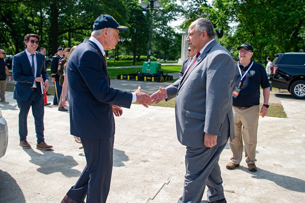 At_left,_U.S._Senator_Tom_Carper_DE_and_Secretary_of_the_Navy_Carlos_Del_Toro_at_right_greet_each_other.